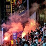 WATCH — Times Square: Knicks Fans Torch School Buses, Light Fireworks After NBA Win